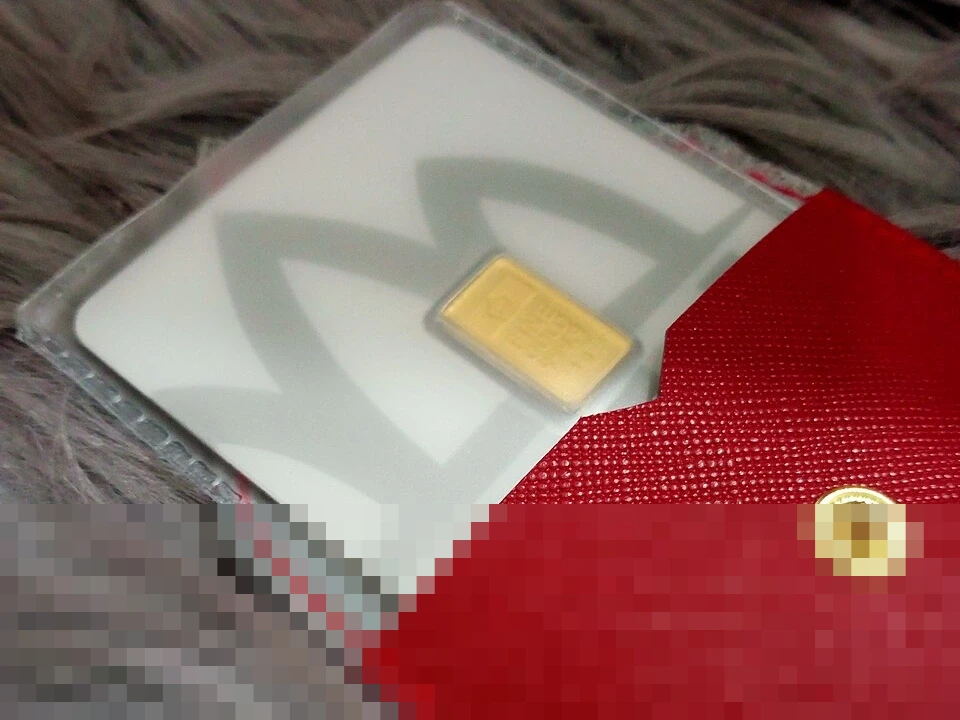 Harga Emas Antam Hari Ini Turun Rp9.000 Per Gram