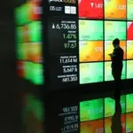 Bursa Efek Indonesia Suspensi Saham Bakrie Sumatera Plantations (UNSP) dan Dua Putra Utama Makmur (DPUM) Akibat Lonjakan Harga Drastis