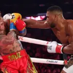 Anthony Joshua Kalahkan Jake Paul dengan KO Dramatis di Ronde Keenam, Guncang Kaseya Center Miami