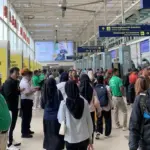 Kisah Pemudik Nataru 2025 di Stasiun Pasar Senen: Rela Ambil Cuti Lebih Awal Demi Hangatnya Keluarga
