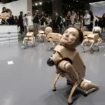 Robot Anjing Berwajah Elon Musk dan Mark Zuckerberg Ludes Terjual, Beeple Sentil Pengaruh AI di Art Basel Miami