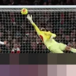 Paul Merson: “Penyelamatan Raya Sangat Penting,” Arsenal Jaga Keunggulan di Puncak Liga Inggris