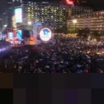 Ribuan Warga Padati Bundaran HI Sambut Tahun Baru 2026, Tanpa Kembang Api Diganti Atraksi Drone dan Donasi