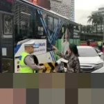 Dirlantas Polda Metro Jaya Tangani Kecelakaan Sedan dan Transjakarta di Bundaran HI, Penyebab Diselidiki