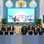 Lifter TNI Rizki Juniansyah Pecahkan Dua Rekor Dunia di SEA Games 2025, Langsung Jadi Kapten